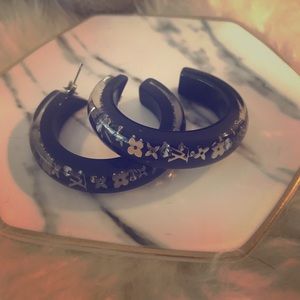 Louis Vuitton hoop earrings with logo in silver